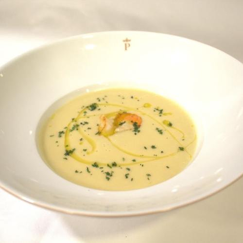 Purrusalda con vieiras braseadas.