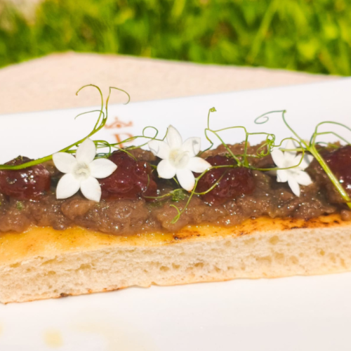 Coca de berenjena sobrasada y miel en Paradores